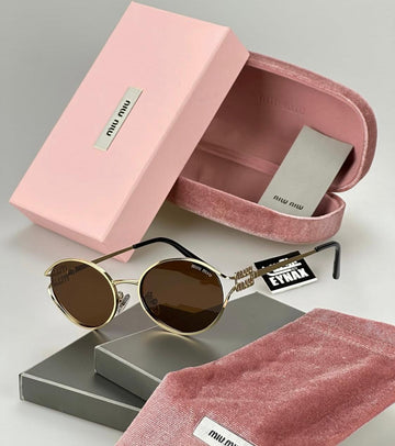 MIUMIU Sunglasses